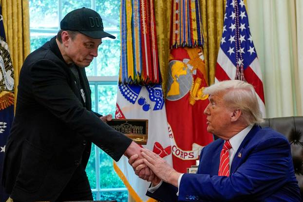 FILE PHOTO: U.S. President Donald Trump and Elon Musk attend a press conference at the White House