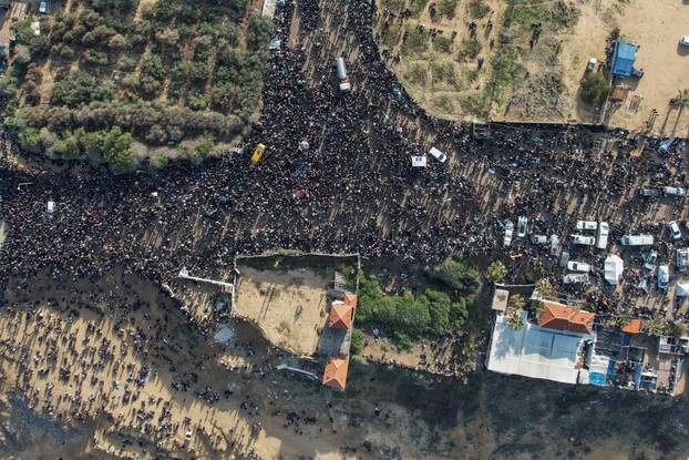 A drone view shows displaced Palestinians waiting to be allowed to return to their homes in northern Gaza, in the central Gaza Strip