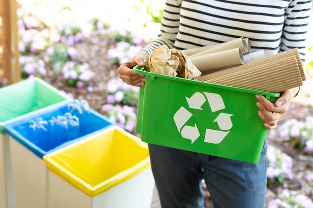 Close-up,Of,A,Green,Basket,With,A,Recycling,Symbol,With