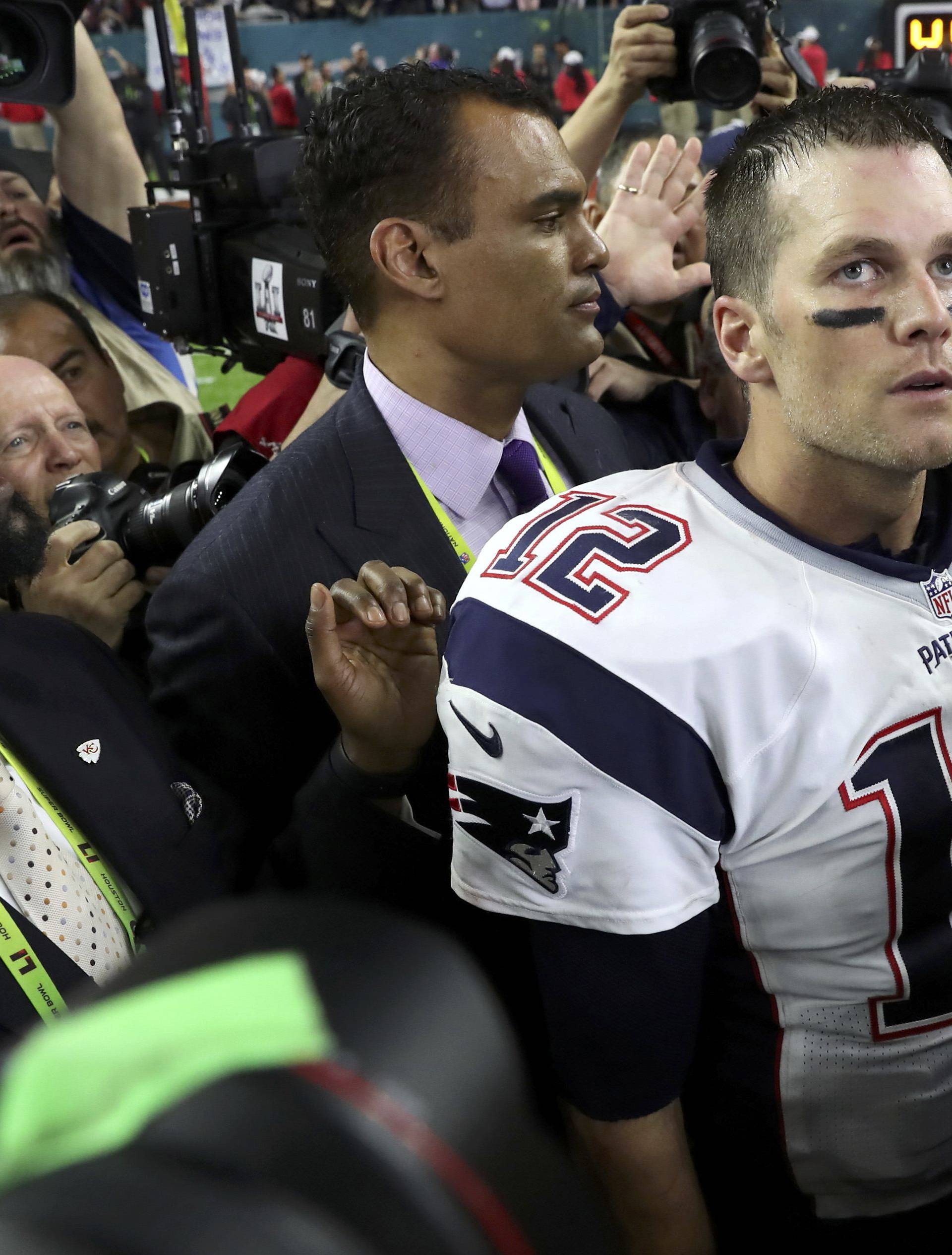 New England Patriots' Brady reacts after his team's game-winning touchdown against the Atlanta Falcons at Super Bowl LI in Houston
