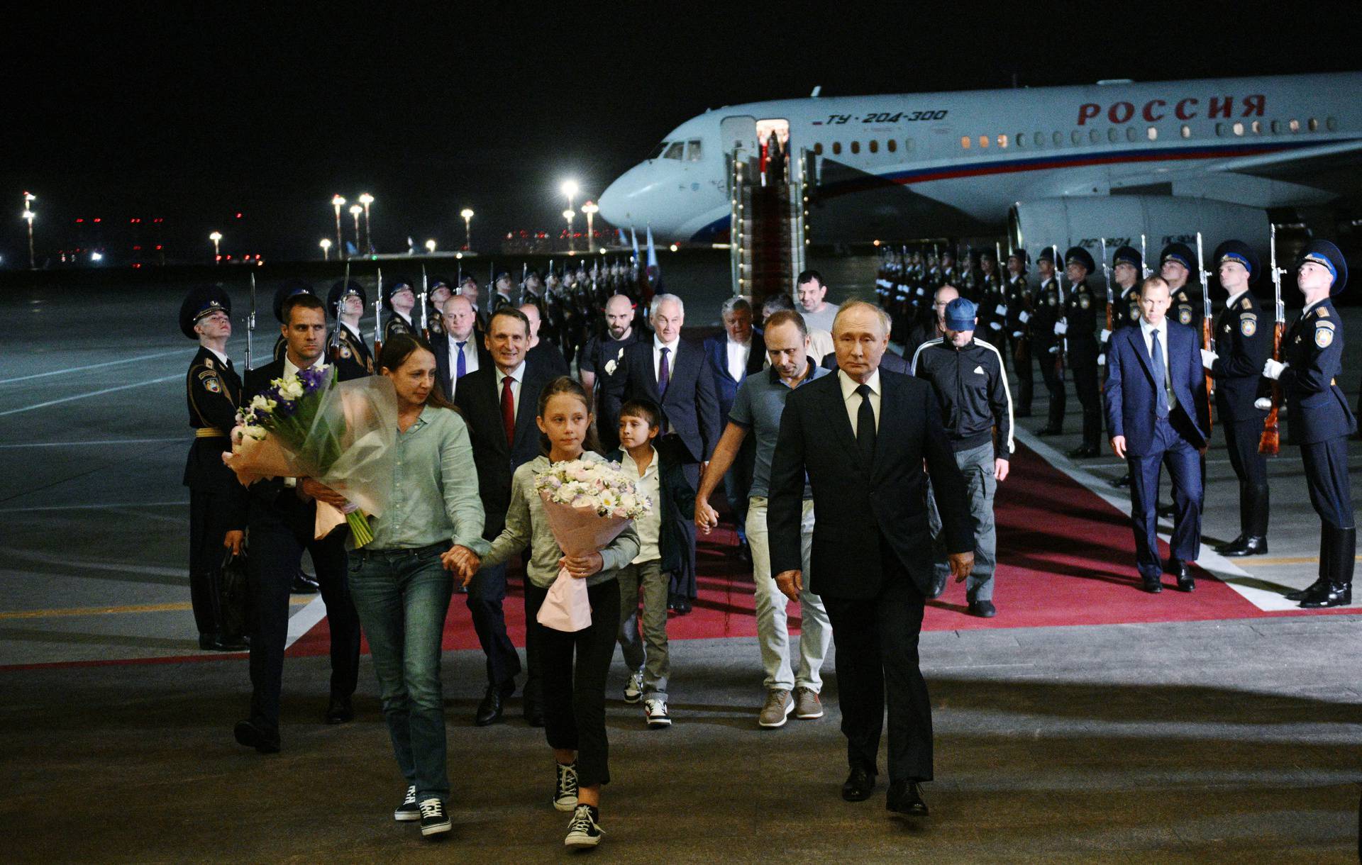 President Putin greets Russians returning to Moscow after prisoner swap