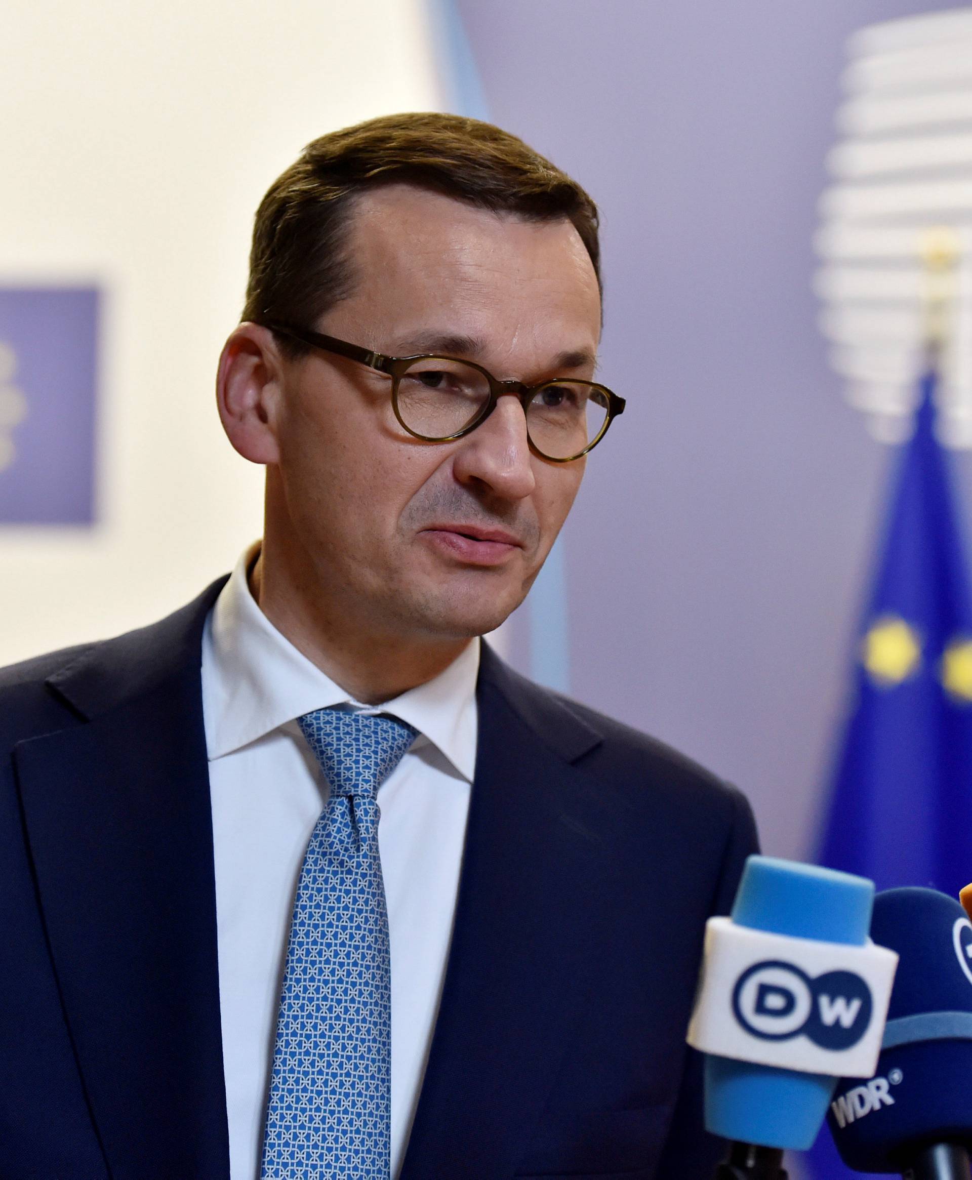 Polish PM Morawiecki leaves a European Union leaders summit in Brussels