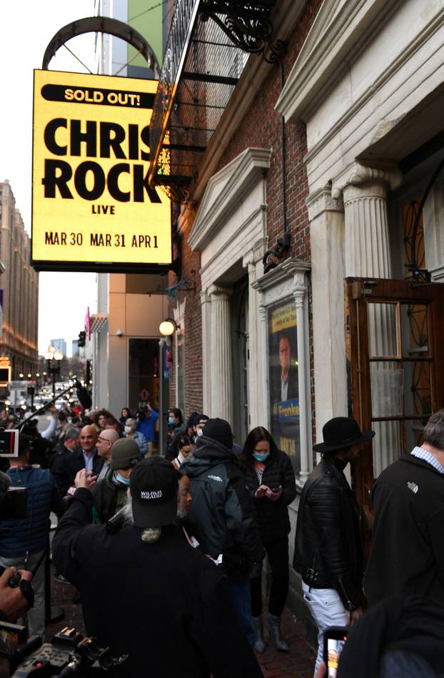 Actor and comedian Chris Rock performs in Boston