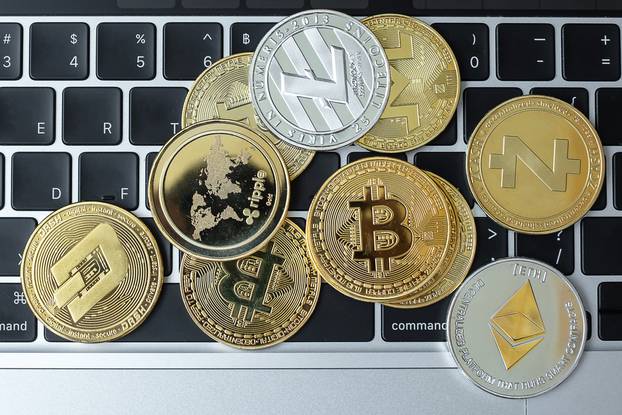 Golden,And,Silver,Cryptocurrency,On,Keyboard,Laptop,,Bitcoin,,,Ethereum,