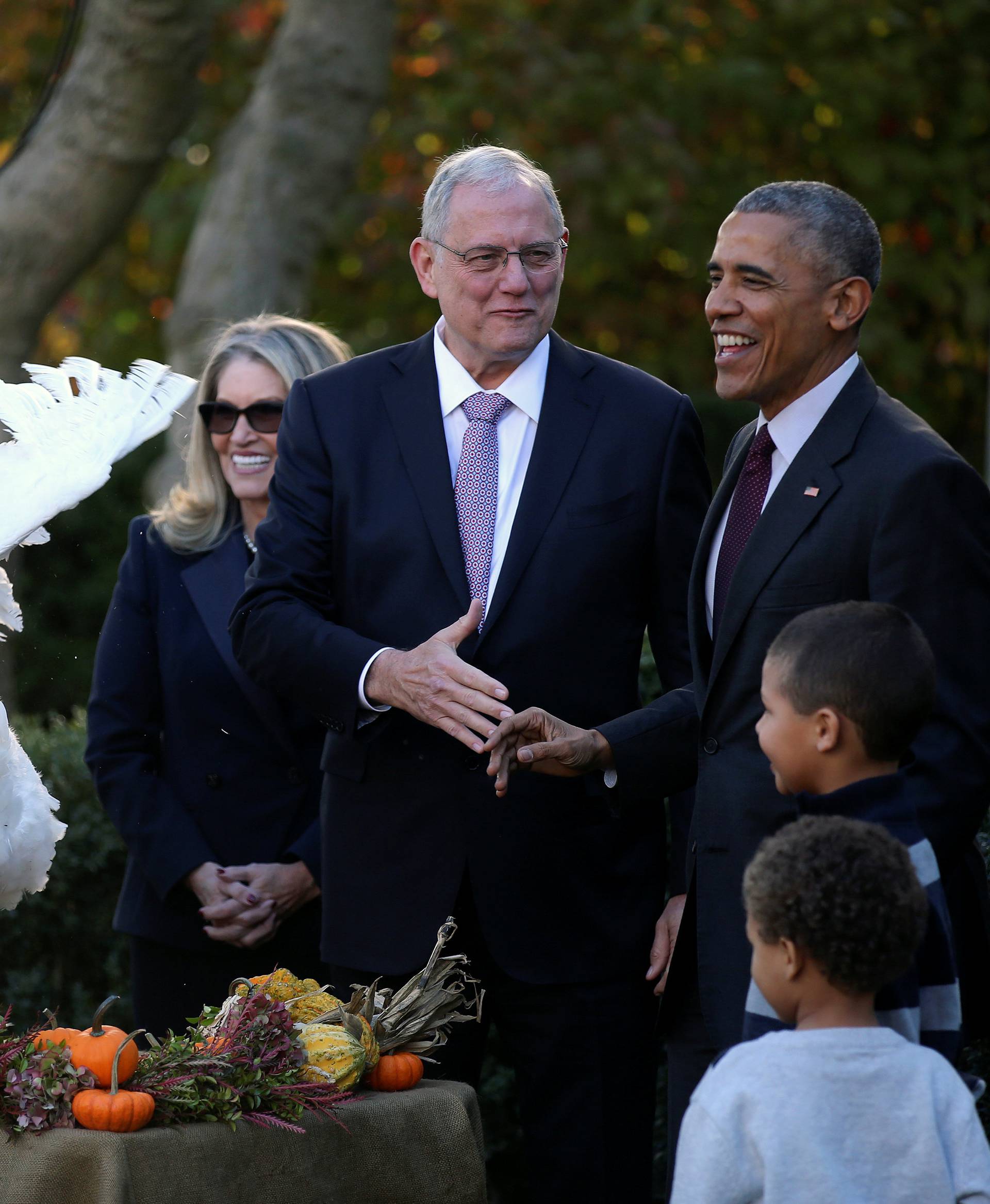 U.S. President Barack Obama leaves after pardoning the National Thanksgiving turkey during the 69th annual presentation of the turkey in the Rose Garden of the White House in Washington