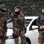 Members of the Turkish police special forces stand guard at the police headquarters in Istanbul
