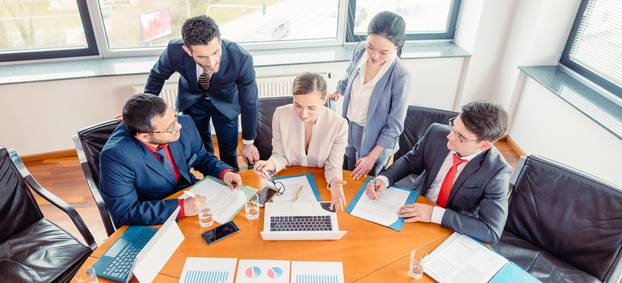Five Business People in a Project Meeting
