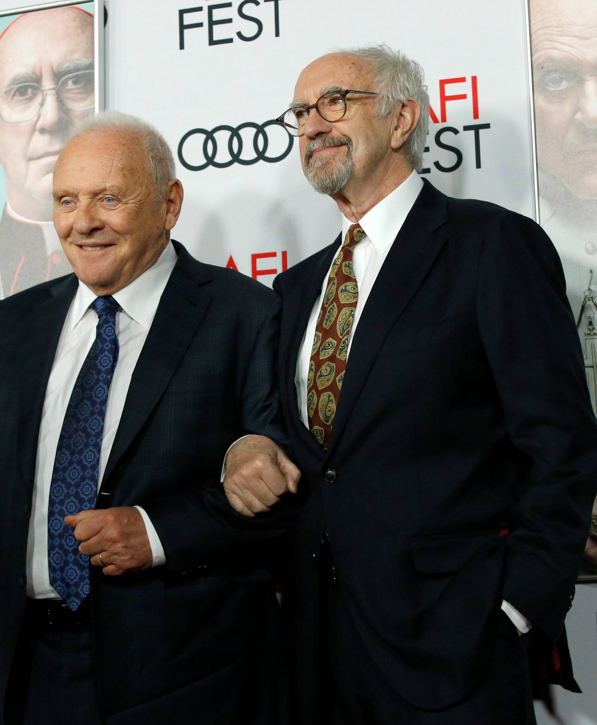 Cast members Pryce and Hopkins pose at a premiere for the film "The Two Popes" during AFI Fest 2019 in Los Angeles