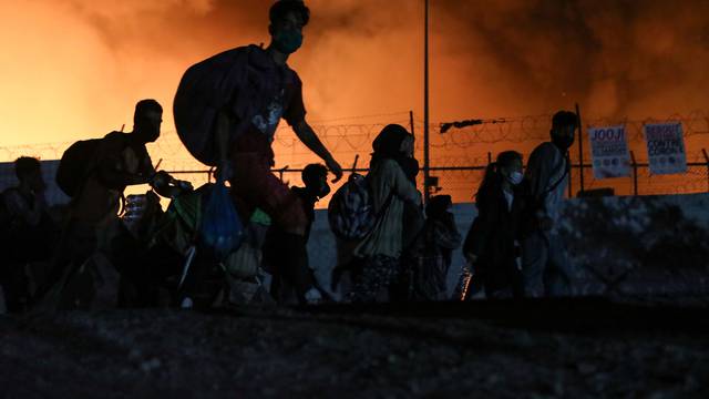 Fire burns at the Moria camp for refugees and migrants on the island of Lesbos