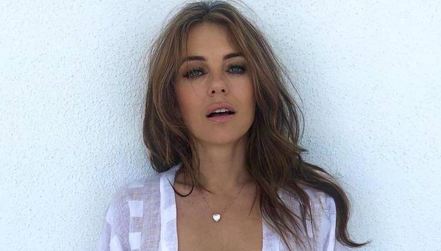 Doček za pamćenje: Elizabeth Hurley na sebi imala samo bikini, kaput, remen i pištolj