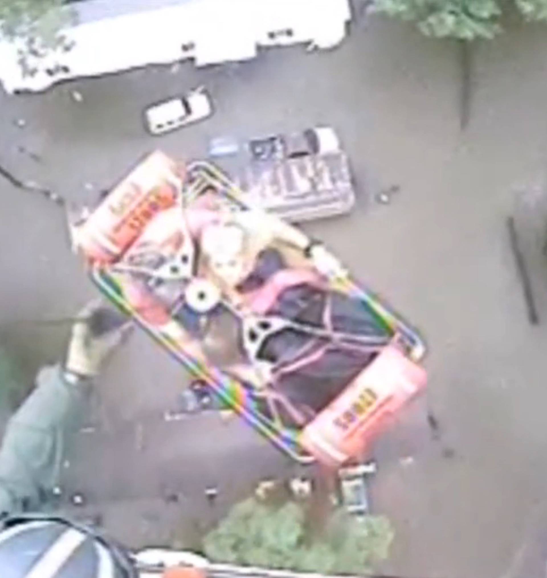 An aircrew from Coast Guard Air Station New Orleans rescues three people from a rooftop due to flooding in Baton Rouge
