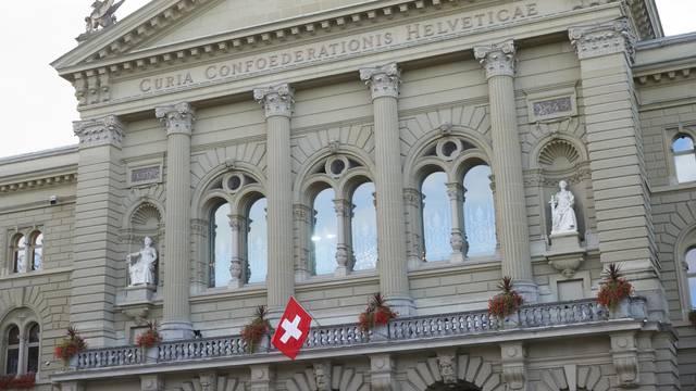A Swiss flag is pictured on the Swiss Parliament Building (Bundeshaus) in Bern