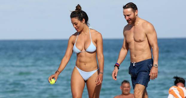 French DJ David Guetta and model girlfriend Jessica Ledon show off their beach bodies in Miami Beach