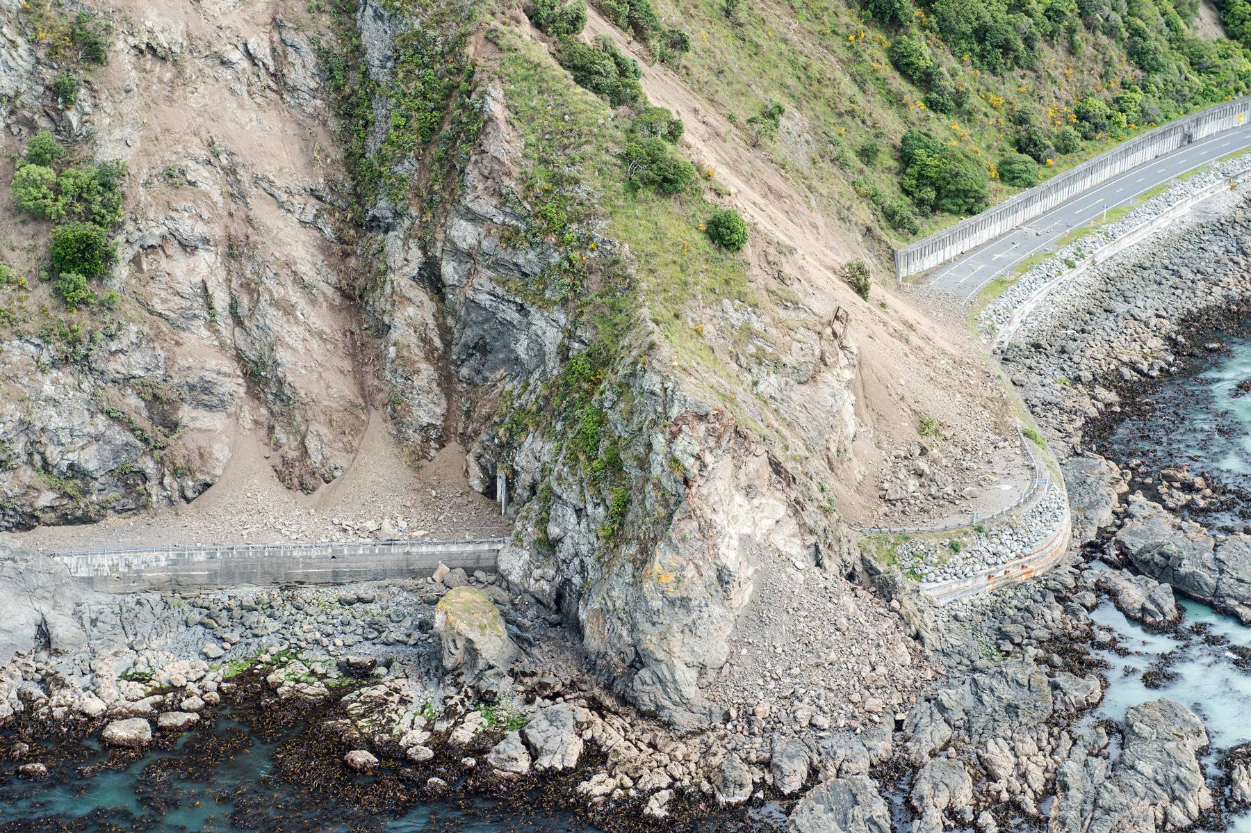 Landslides block State Highway One near Kaikoura on the upper east coast of New Zealand's South Island following an earthquake