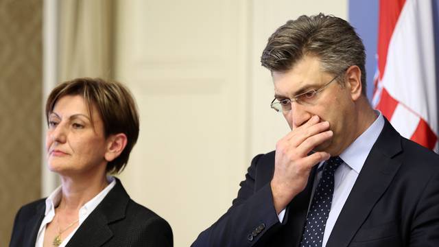Croatia's Prime Minister Andrej Plenkovic and Martina Dalic, Minister of Economy, attend a news conference in a government building in Zagreb
