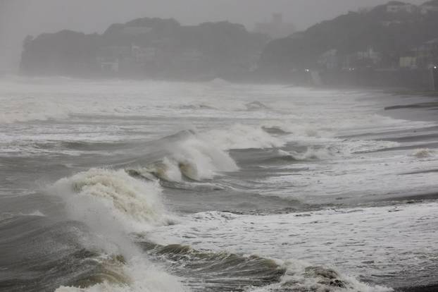 Rough waves hit the coast as Typhoon Dujuan approaches, in Kamakura