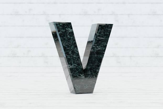 Marble 3d letter V uppercase. Dark green marble letter on white wood background. 3d render.