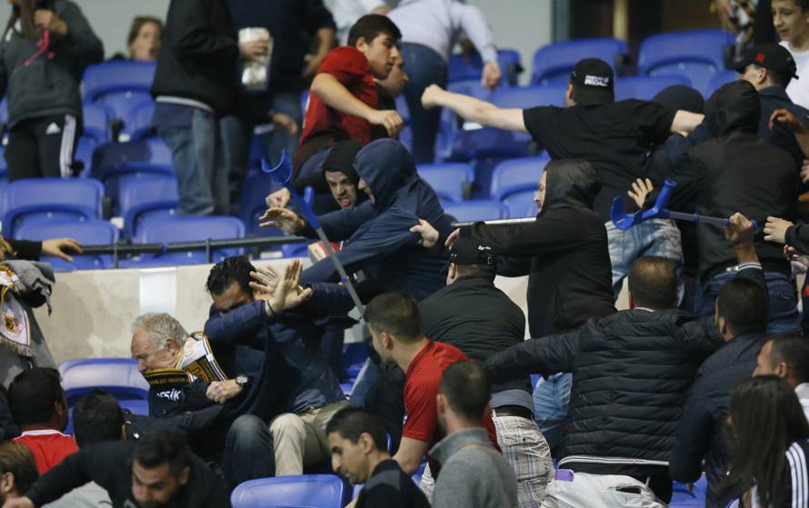 Besiktas and Lyon fans clash in the stands