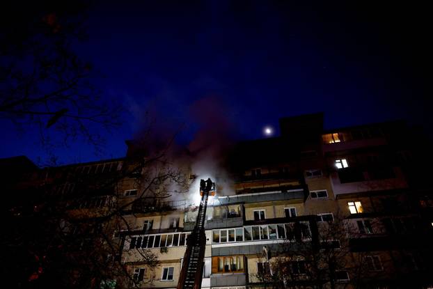 Aftermath of an overnight Russian drone and missile strike in Kyiv