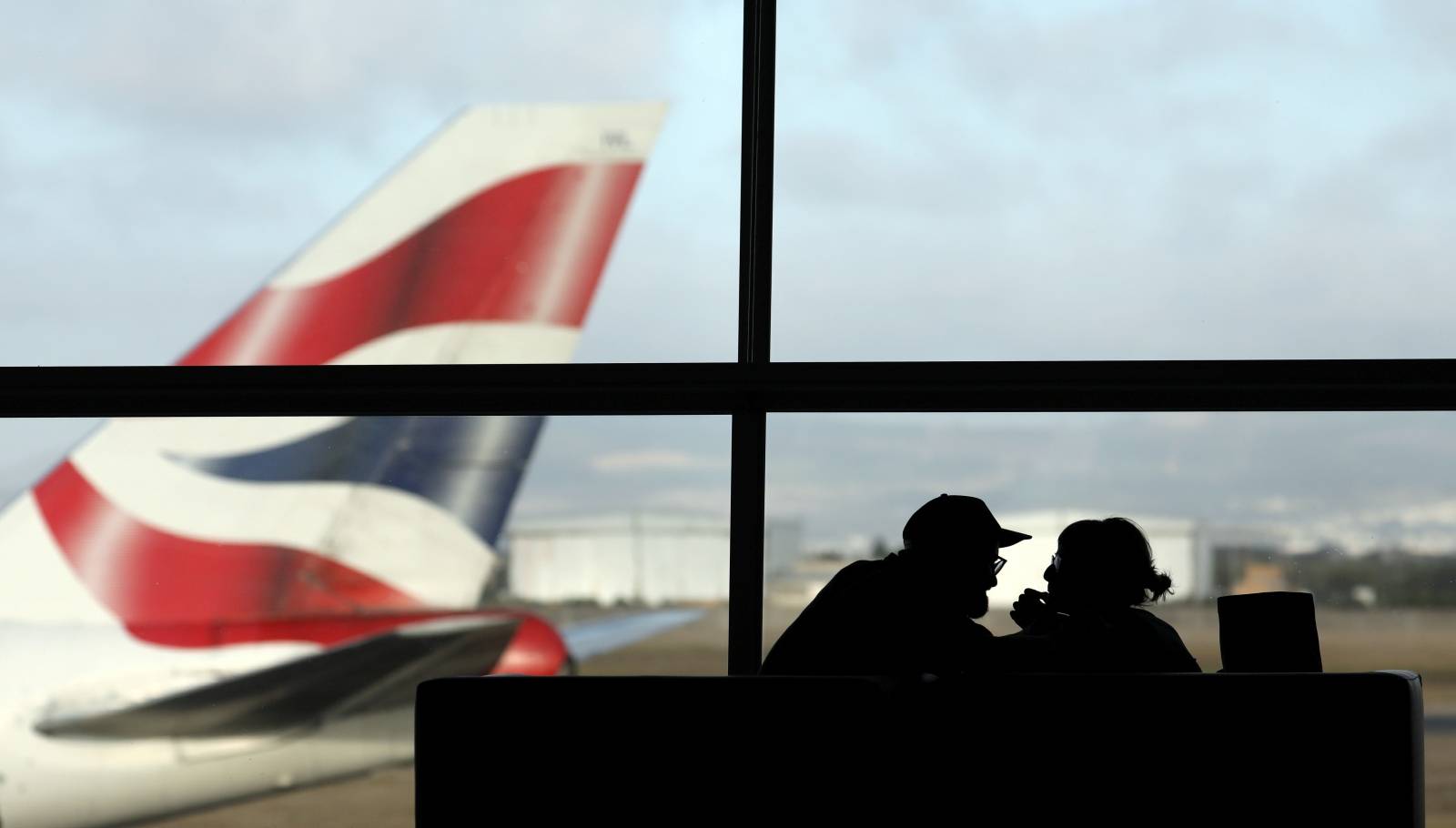 FILE PHOTO: A British Airways Boeing 747 passenger aircraft prepares to take off as passengers wait to board a flight in Cape Town International airport in Cape Town