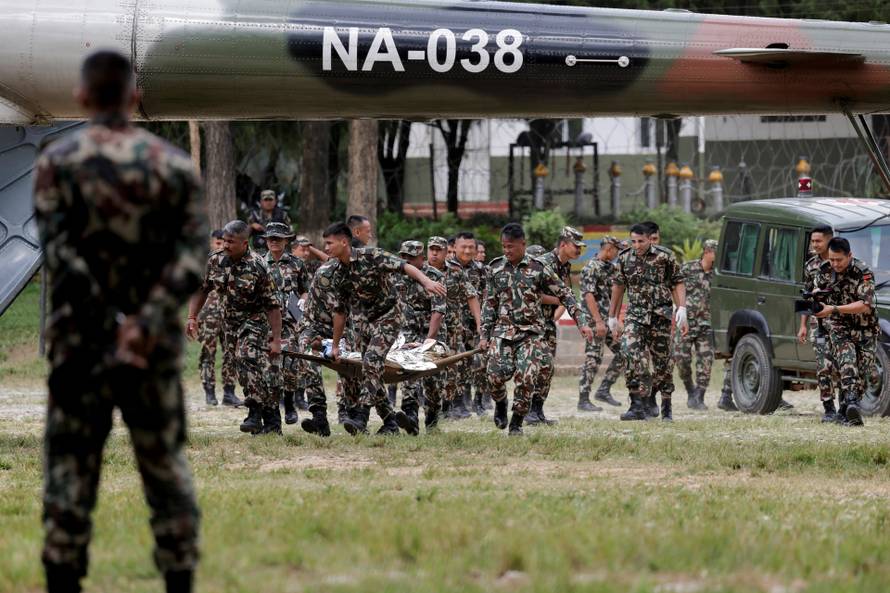 A survivor is airlifted following a flash flood at Trishuli, Nepal