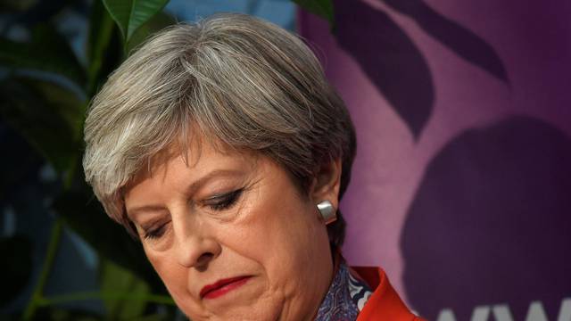 Britain's Prime Minister Theresa May waits for the result of the vote in her constituency at the count centre for the general election in Maidenhead,