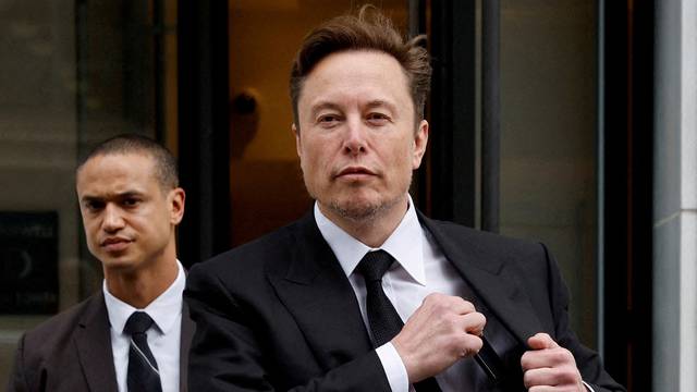 FILE PHOTO: Tesla CEO Musk leaves the company’s local office in Washington