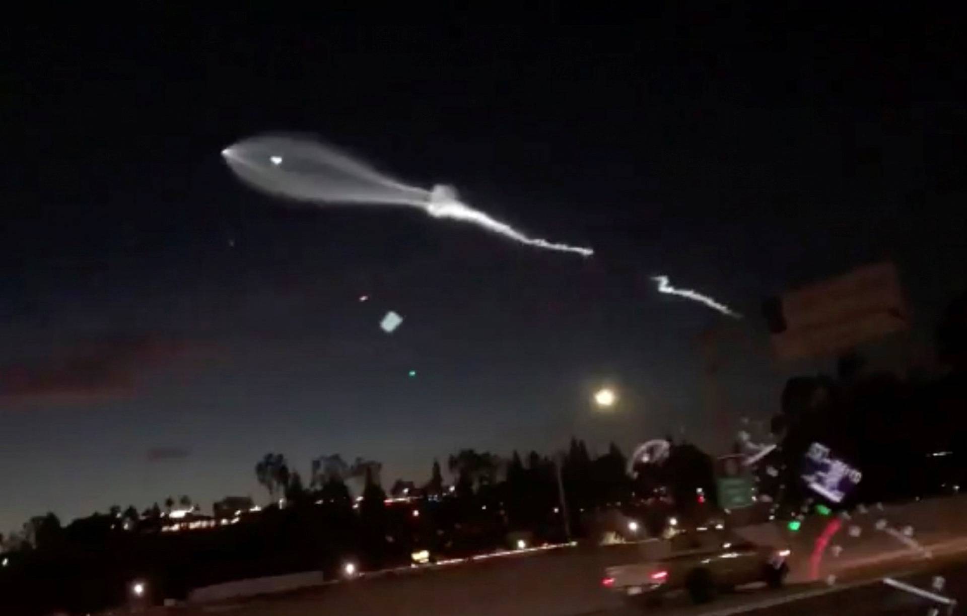 SpaceX's Falcon 9 rocket lifts off in the air, as seen from Orange County, California