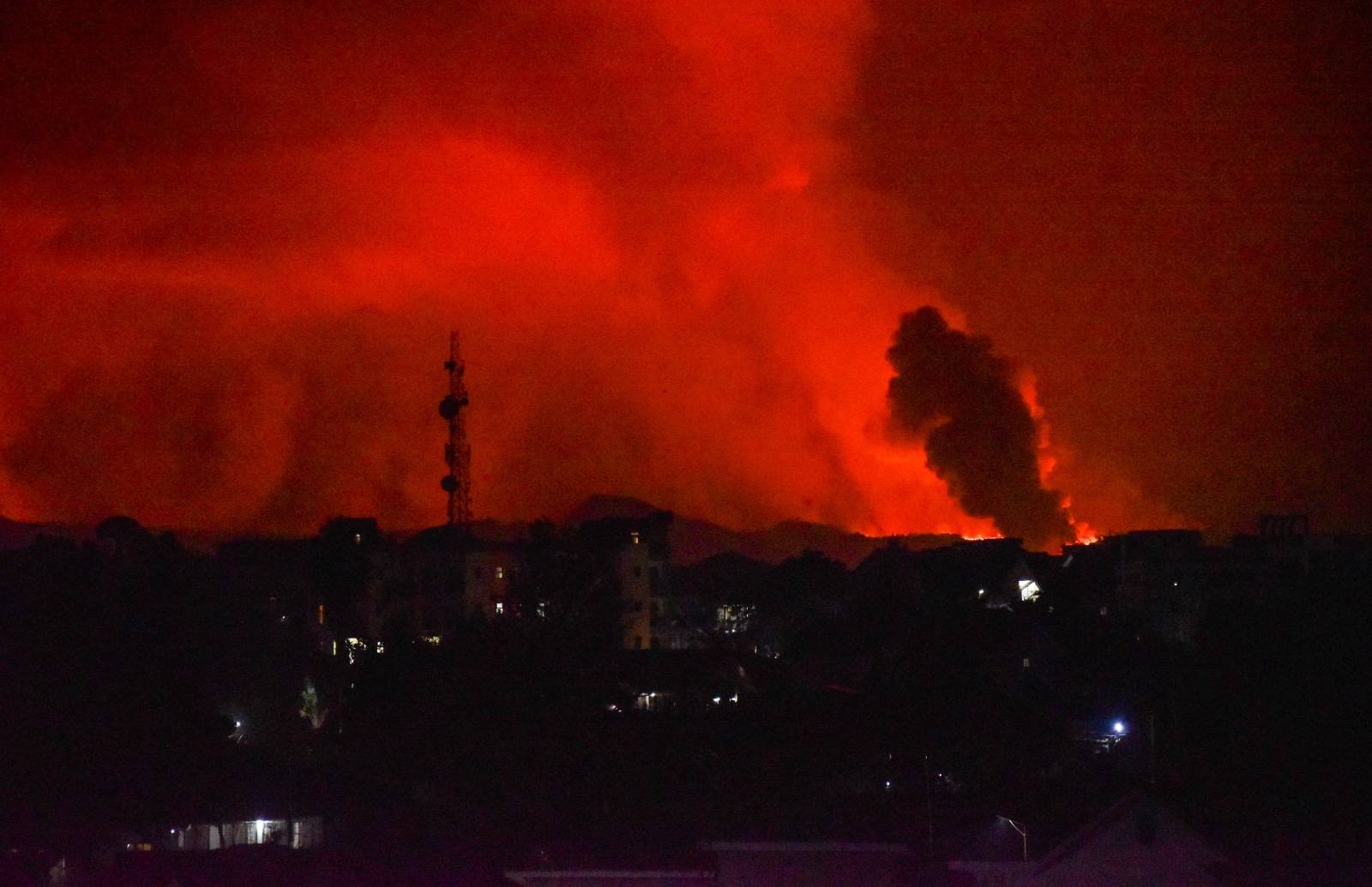 A general view shows smoke and flames at the volcanic eruption of Mount Nyiragongo near Goma