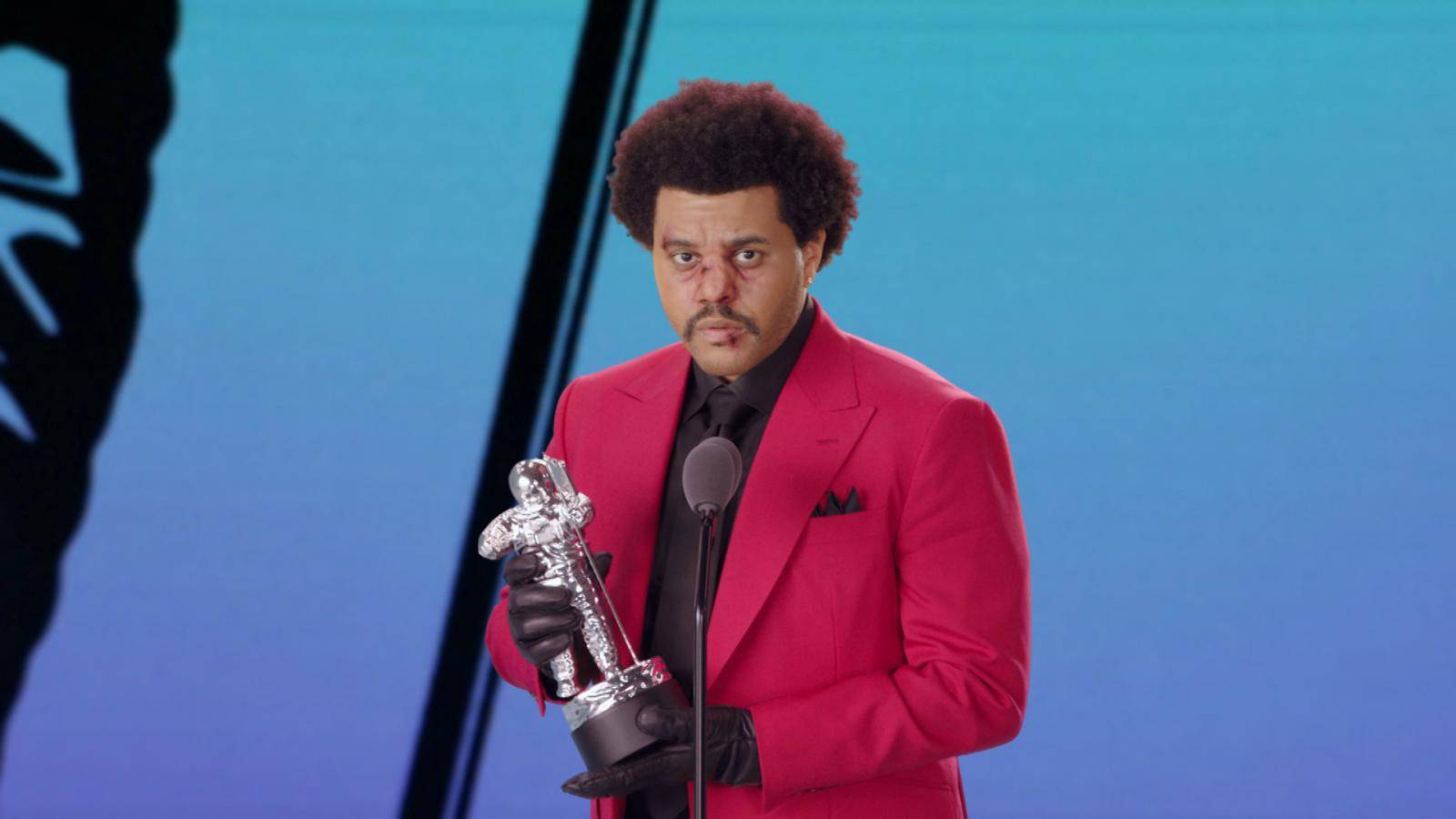 The Weeknd accepts the award for Best R&B during the 2020 MTV VMAs