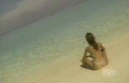 Mlada Heidi Klum pozira na plaži samo u tangicama