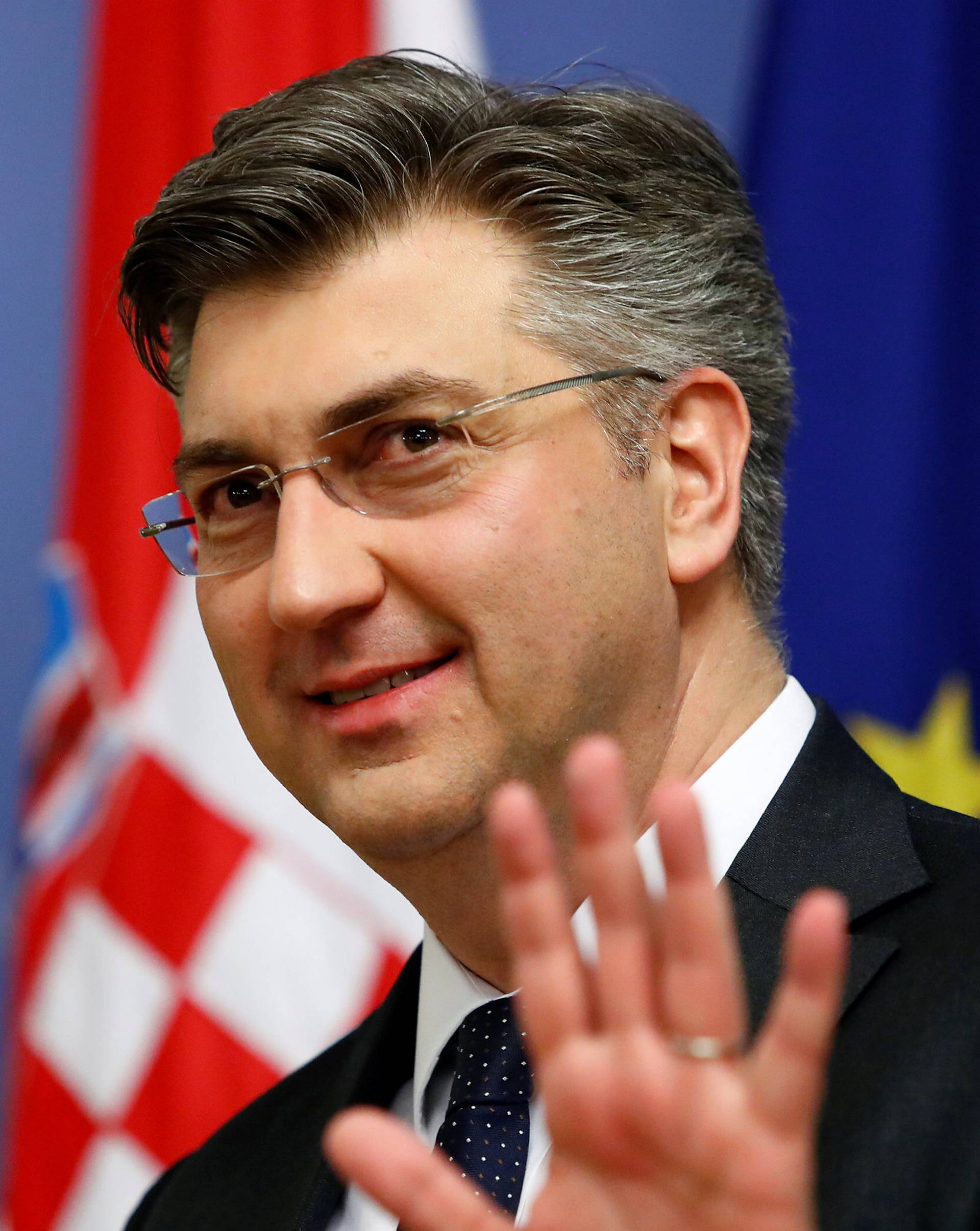 Croatia's Prime Minister Andrej Plenkovic gestures in a government building in Zagreb