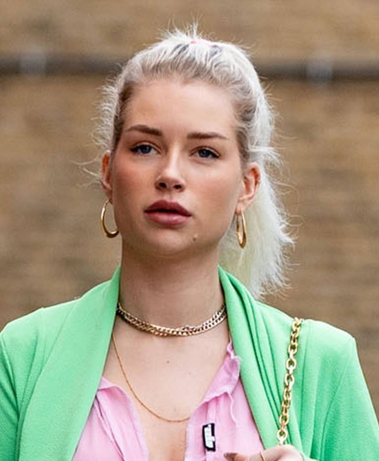 Lottie Moss looks chic and stylish in a PrettyLittleThing Green suit and a sheer pink shirt from the brand. *PICTURES TAKEN ON THE 13/09/21*
