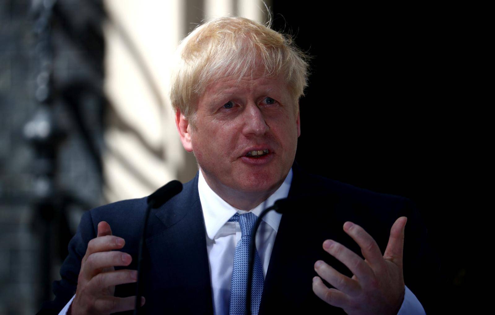 Britain's new Prime Minister, Boris Johnson, delivers a speech outside Downing Street, in London