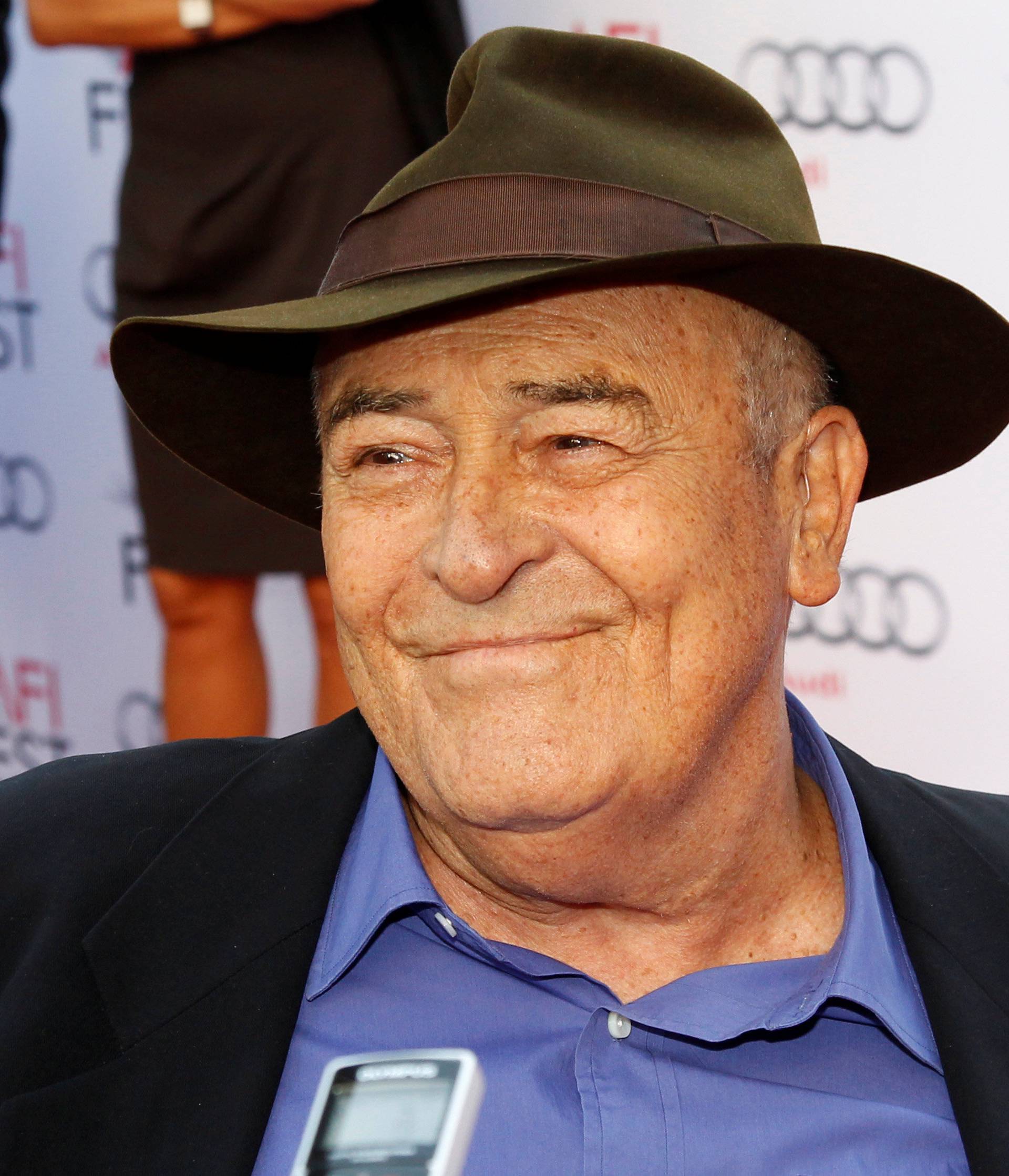 FILE PHOTO: Bertolucci is interviewed as he arrives for a gala screening of "The Last Emperor" in 3D at the AFI Fest 2013 in Hollywood