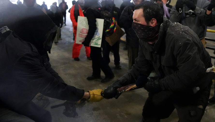 People attend the "March Against Minnesota Fraud" in Minneapolis