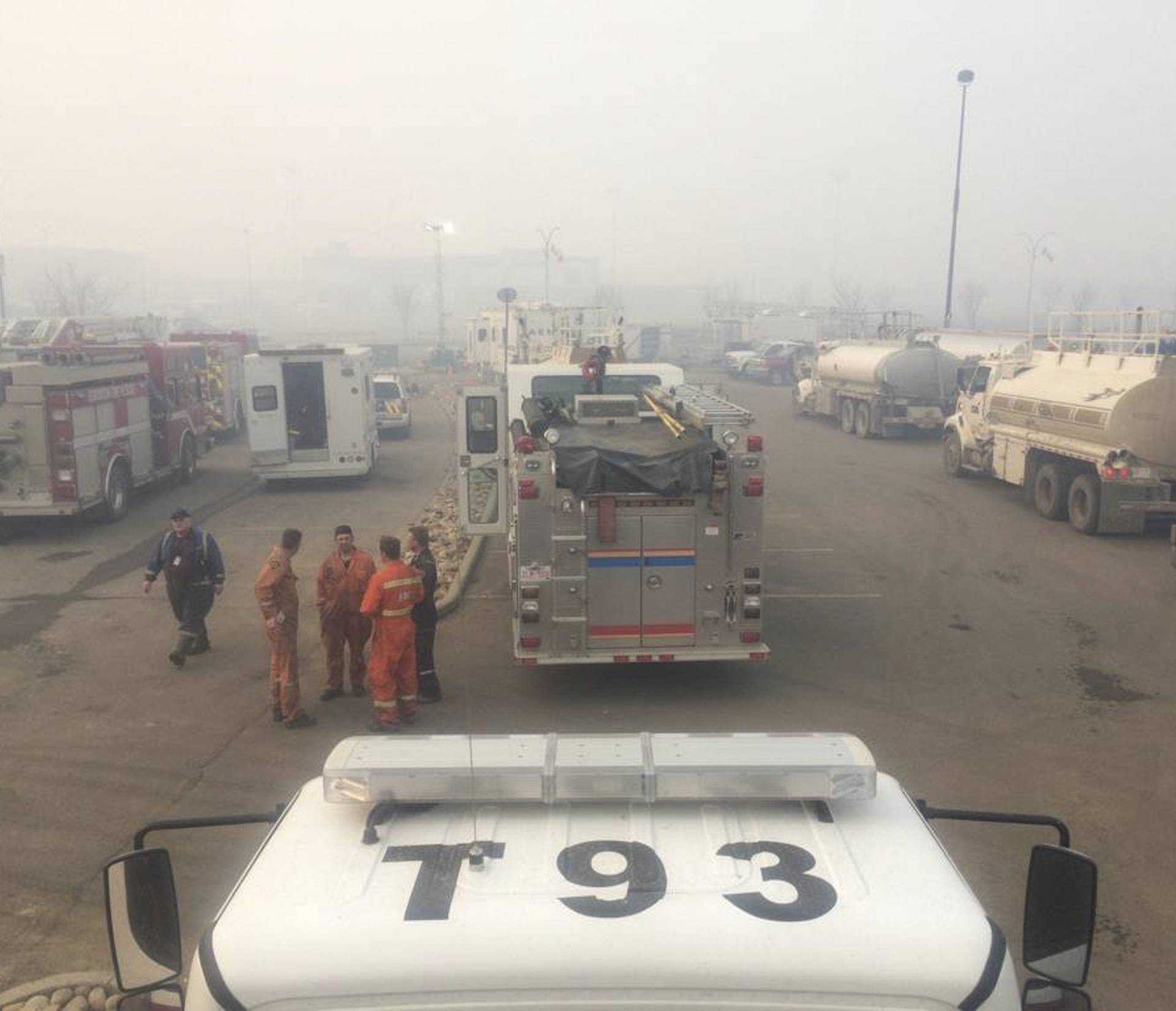 Municipal District of Bonnyville Alberta photo of Bonnyville Regional Fire Authority crews waiting for their assignments after a long night of firefighting in Fort McMurrary Alberta