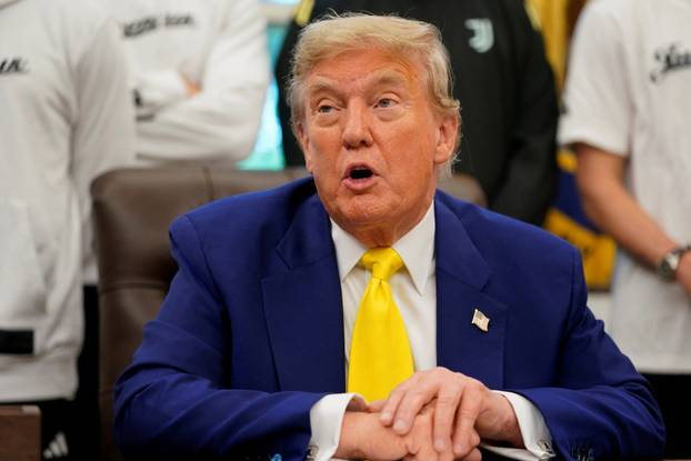 U.S. President Donald Trump meets with players of the Juventus soccer team at the White House in Washington