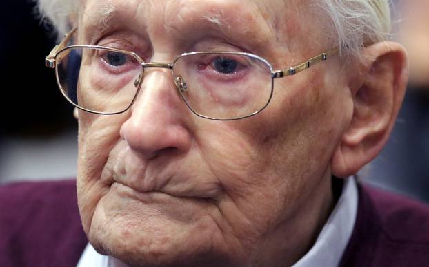 FILE PHOTO: Groening, defendant and former Nazi SS officer dubbed the "bookkeeper of Auschwitz", is pictured in the courtroom during his trial in Lueneburg