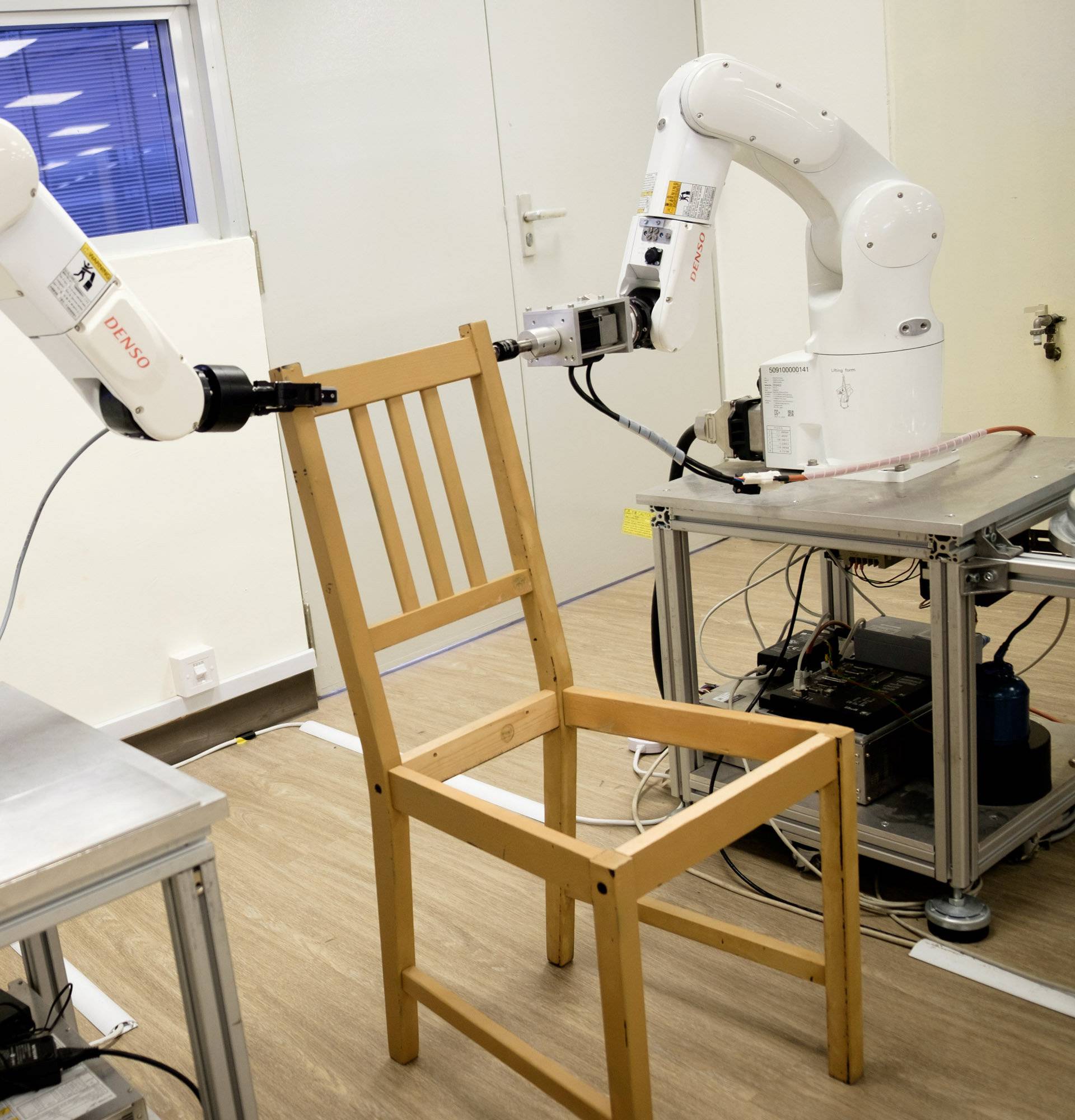 Robots assemble an Ikea chair in Singapore