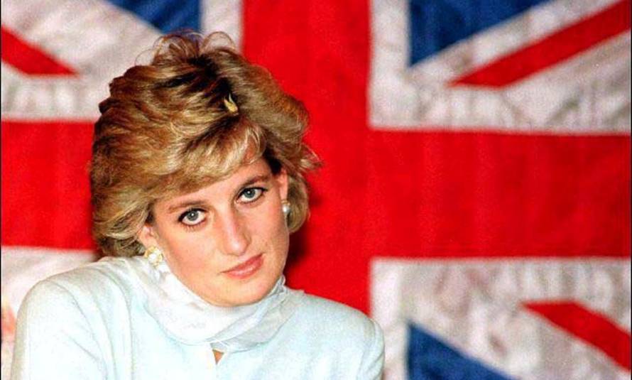 FILE PHOTO: FILE PHOTO OF THE PRINCES OF WALES SITTING IN FRONT OF A BRITISH FLAG