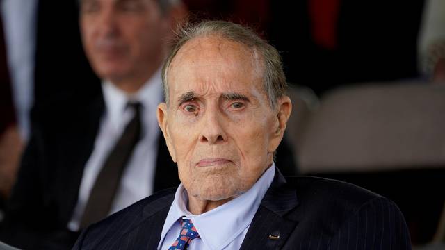 FILE PHOTO: Bob Dole attends welcome ceremony in honor of new Joint Chiefs Chairman Milley at Joint Base Myer-Henderson Hall, Virginia