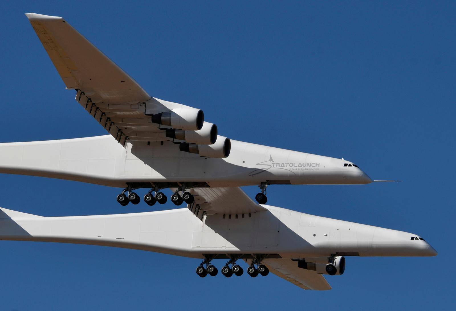 The world's largest airplane, built by the late Paul Allen's company Stratolaunch Systems, makes its first test flight in Mojave