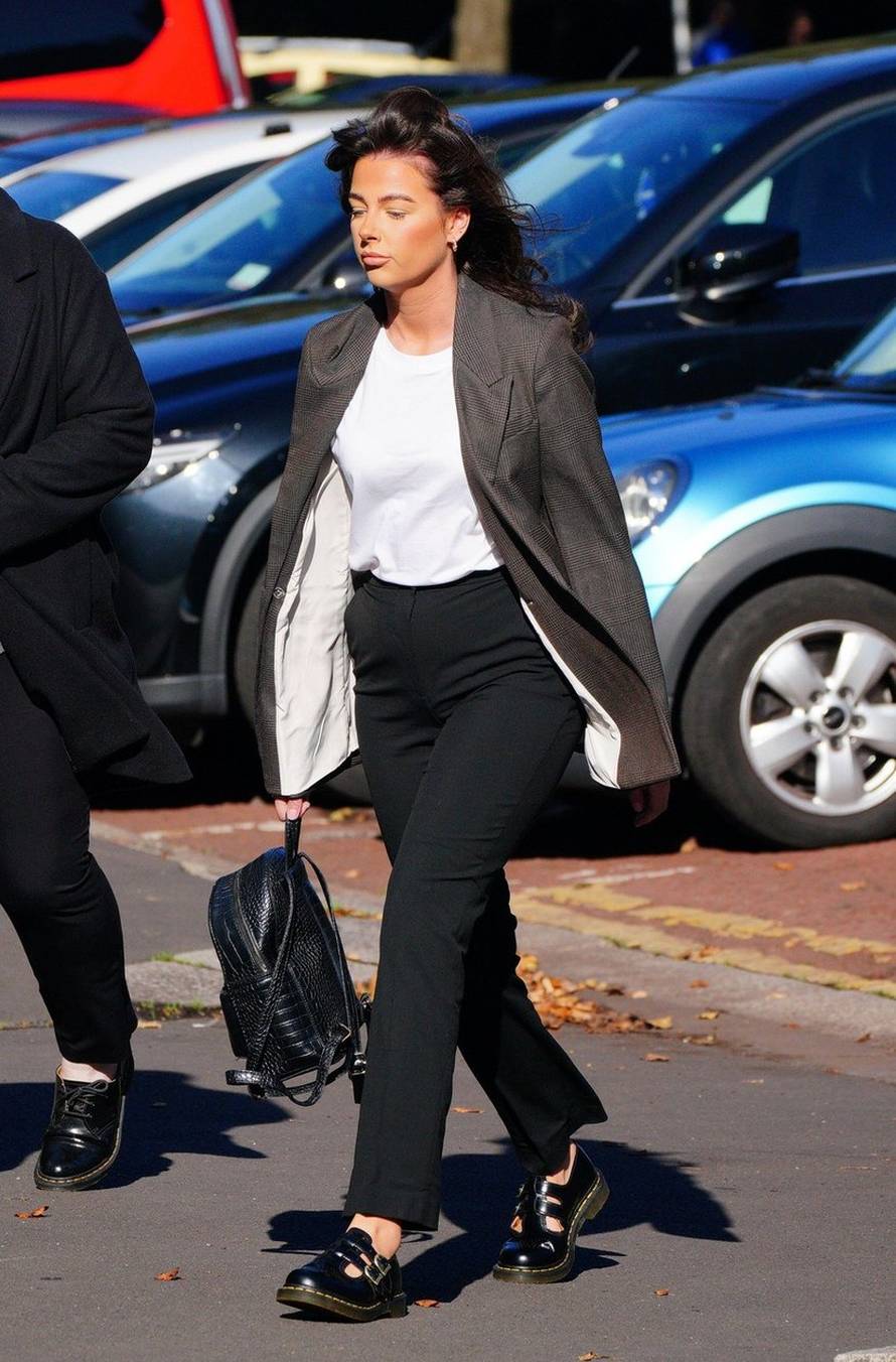 Female prison officer Ruth Shmylo arriving at Cardiff Crown Court where she pleaded not guilty to having an "inappropriate relationship" with an inmate. The 25 year old from Pontypridd, South Wales, denies becoming involved with the male prisoner at the c