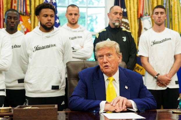 U.S. President Donald Trump meets with players of the Juventus soccer team at the White House in Washington