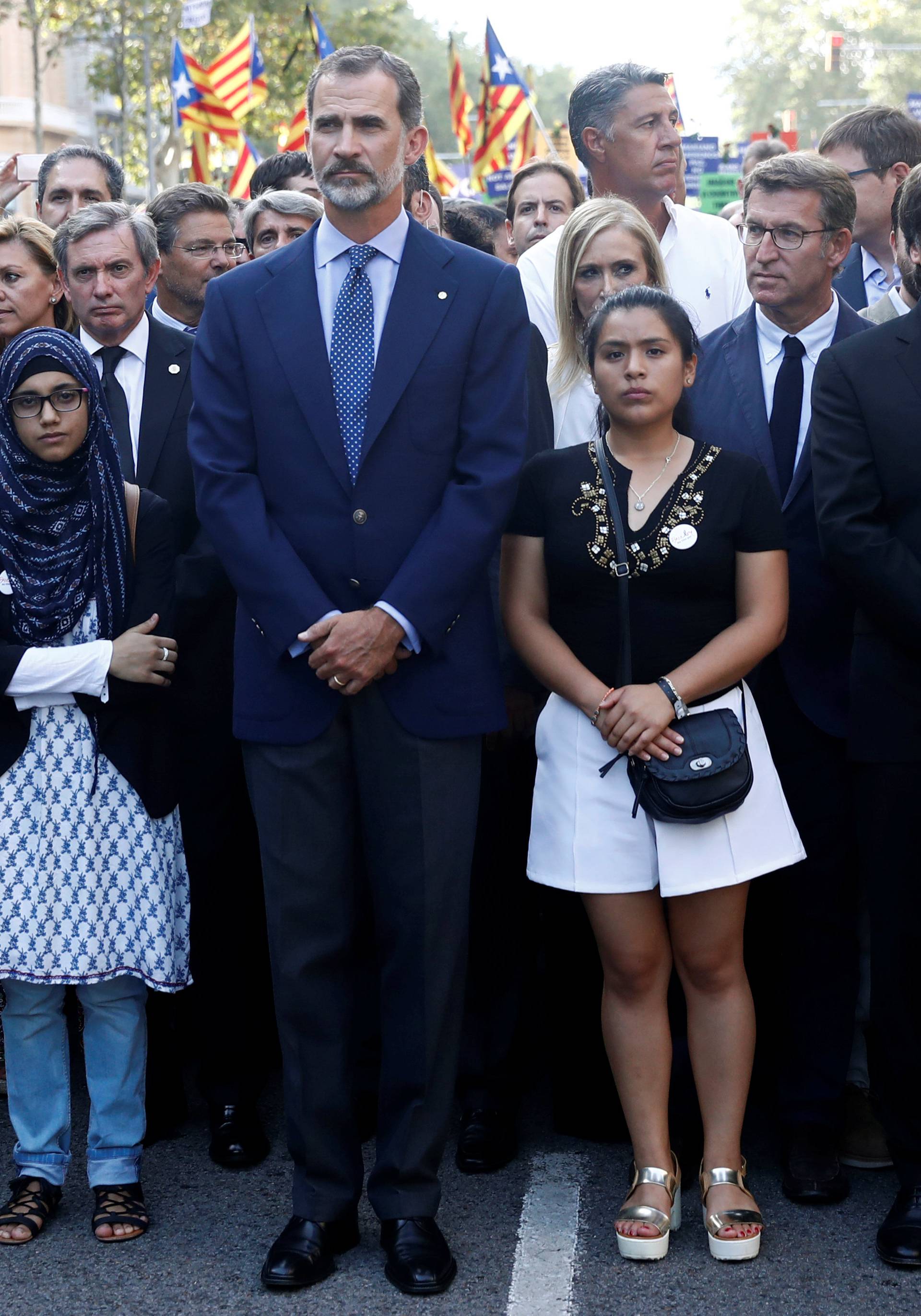 Spain's King Felipe, PM Rajoy and Catalan regional president Puigdemonttake part in a march of unity after the attacks last week, in Barcelona, Spain