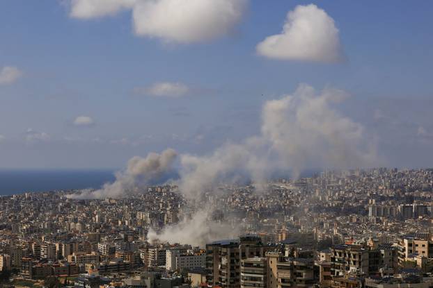 Smoke rises following an Israeli strike on the southern suburbs of Beirut