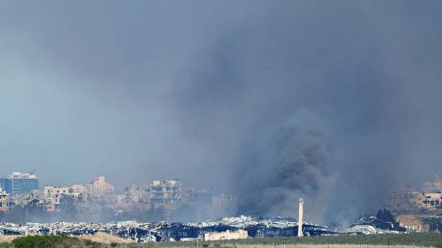 Smoke rises in Gaza, amid the ongoing conflict between Israel and the Palestinian Islamist group Hamas, as seen from Southern Israel