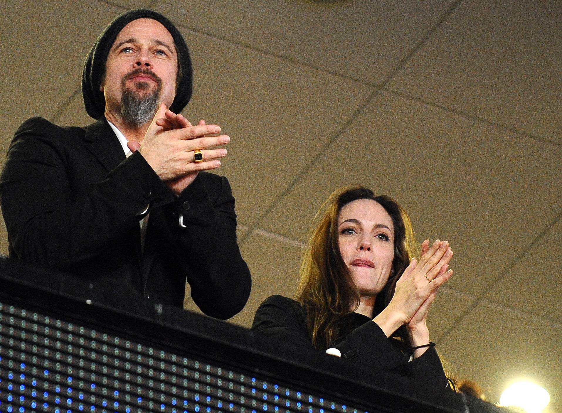 Angelina Jolie and Brad Pitt at Superbowl - Miami