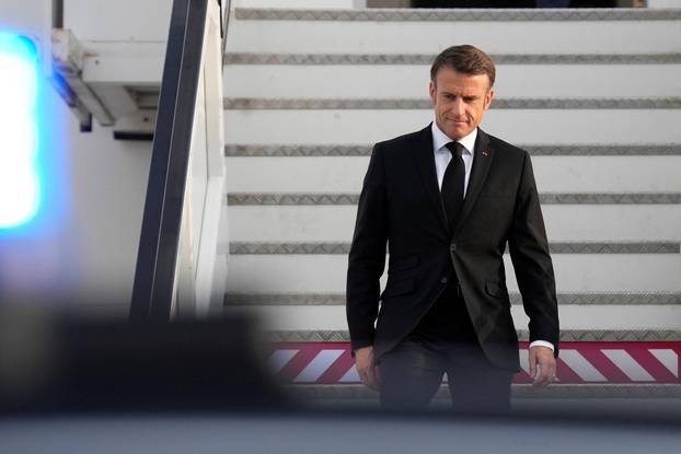 French President Emmanuel Macron arrives at the Ben Gurion airport